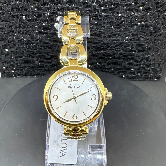 Women's (NWT) Bulova w/Mother-of Pearl Face, Gold Bezel, and Gold Chain Bracelet - Picture 5 of 5